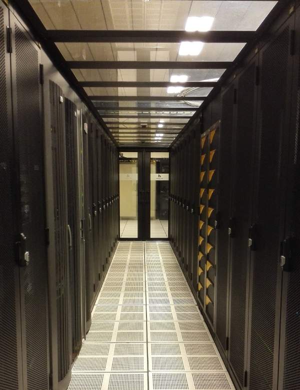 An aisle of servers in a data center