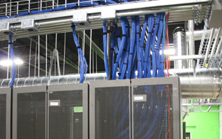 Blue cables routed above server racks.