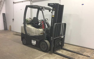 Forklift parked in a data center storage area.