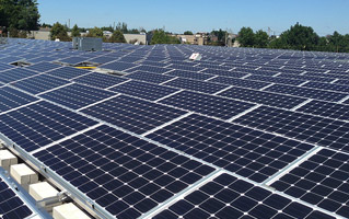 Roof covered with solar panels for renewable energy.